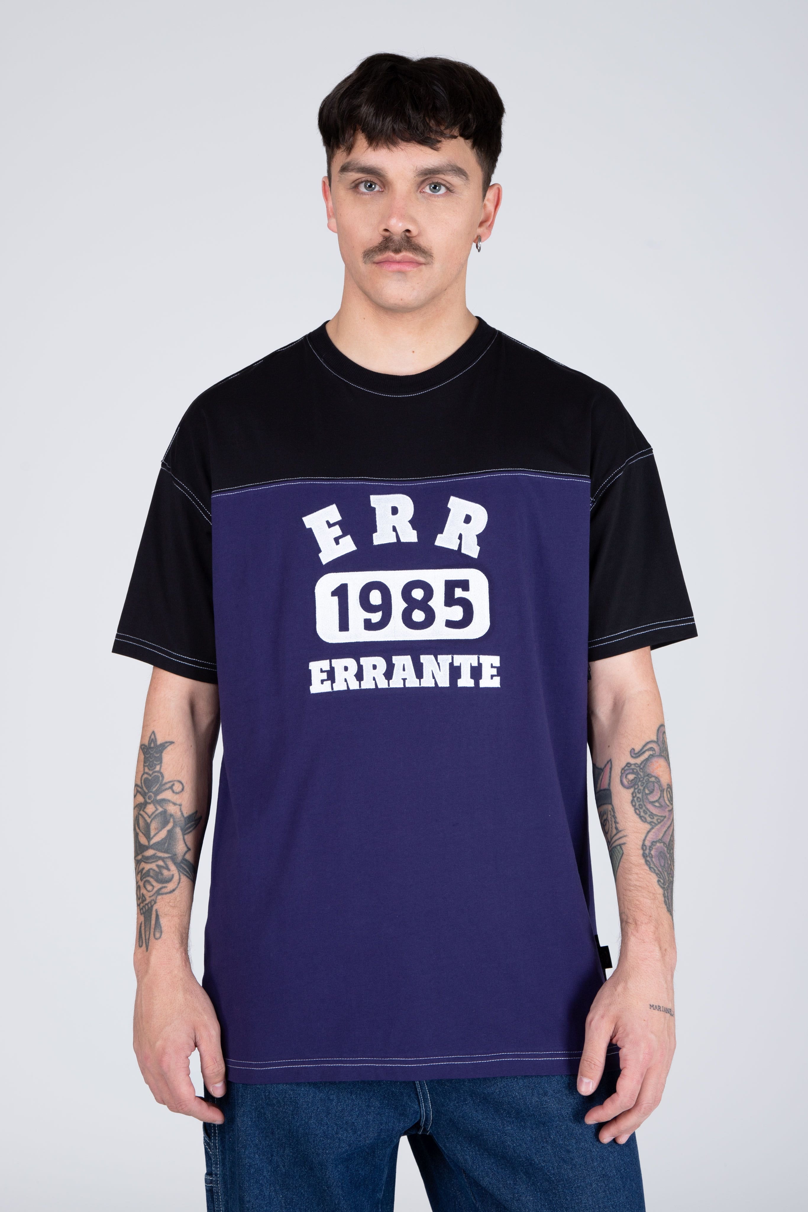 Polera M/C Nomad Morado/Negro ERRANTE
