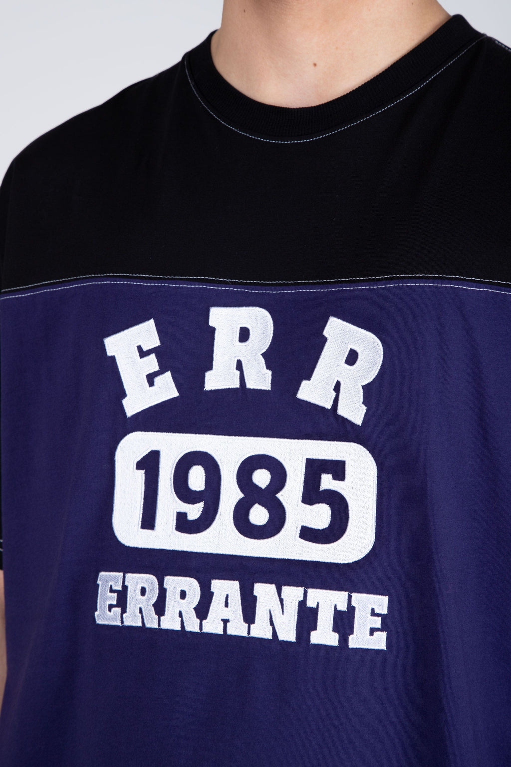 Polera M/C Nomad Morado/Negro ERRANTE