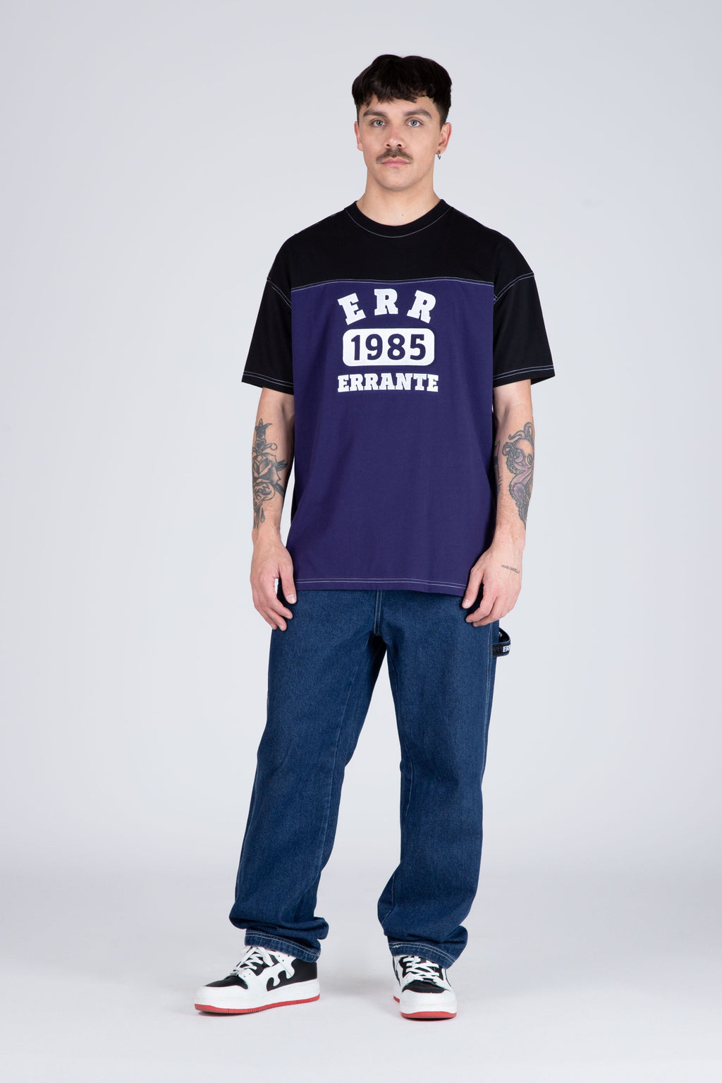 Polera M/C Nomad Morado/Negro ERRANTE