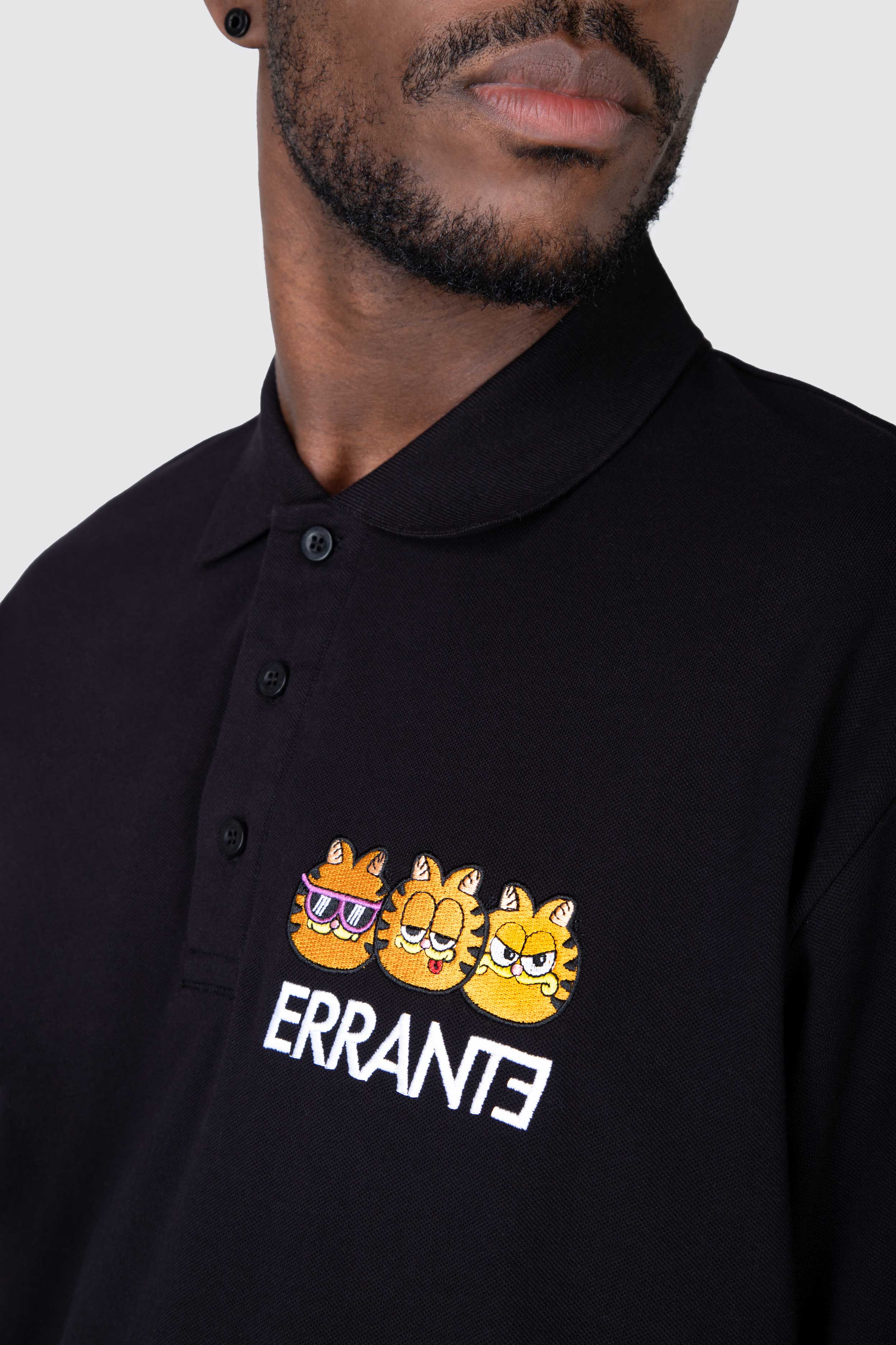 Polera M/C Pique Garfield Triple Ego Negro ERRANTE 