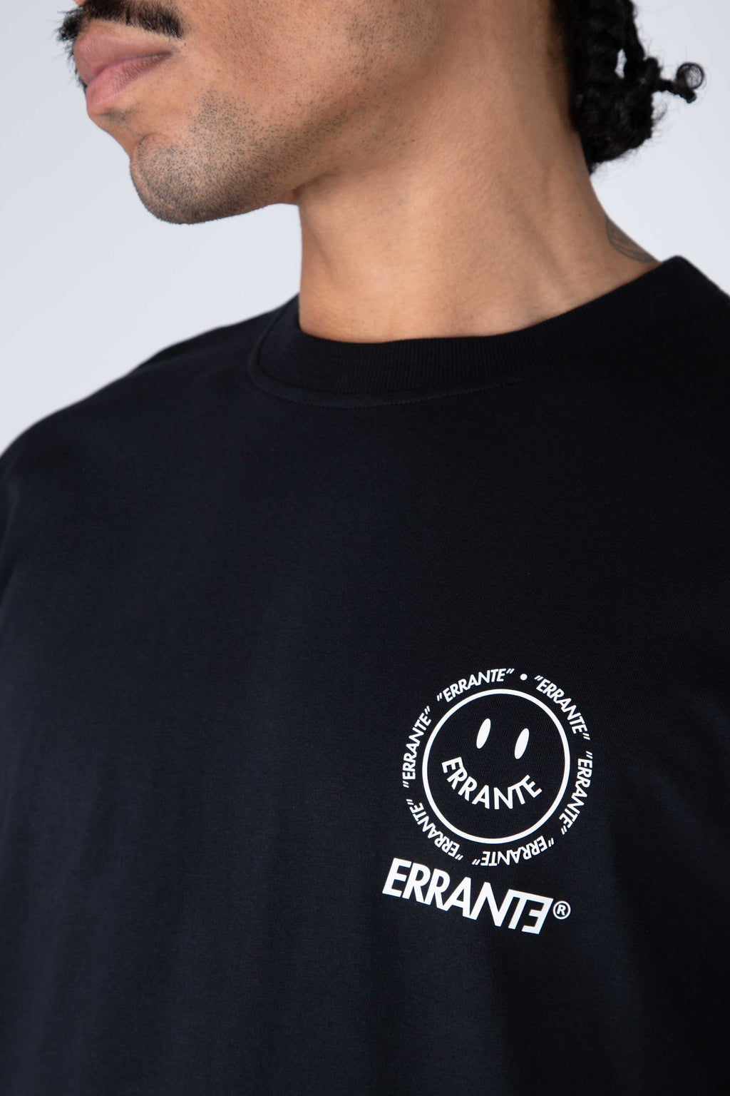 Polera M/C Happy Face Negro ERRANTE