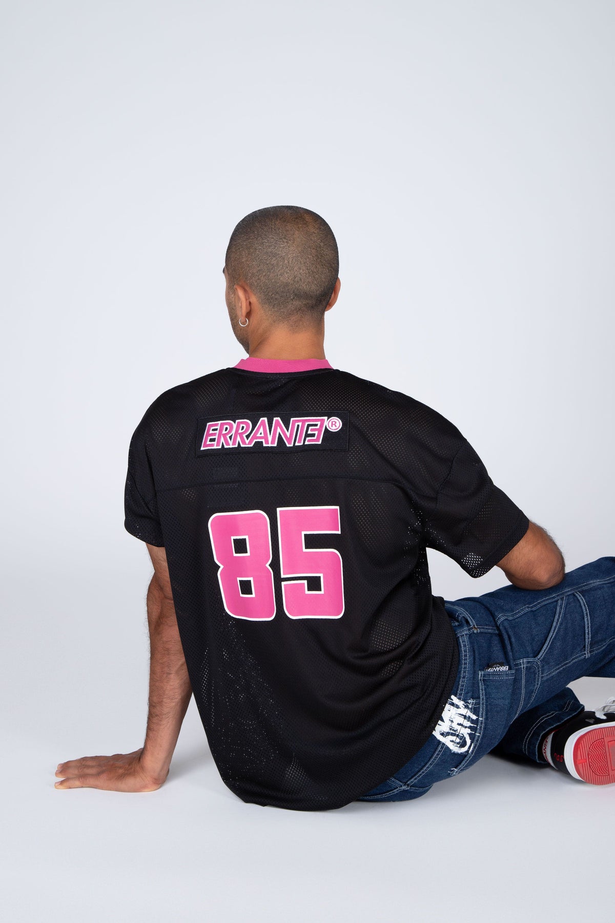 Polera Manga Corta Mesh Off Spring Negro ERRANTE