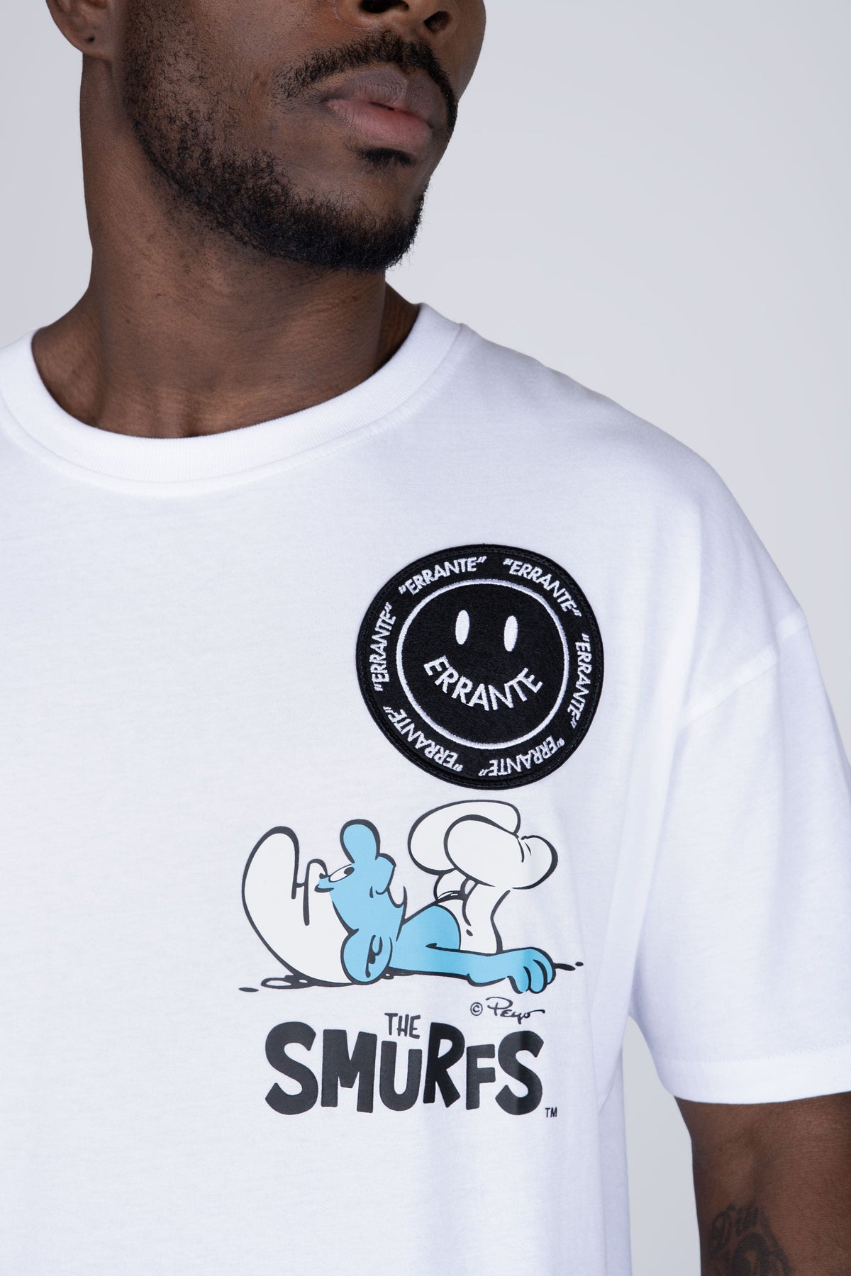 Polera Manga Corta Pitufos Bubbly Blanco ERRANTE