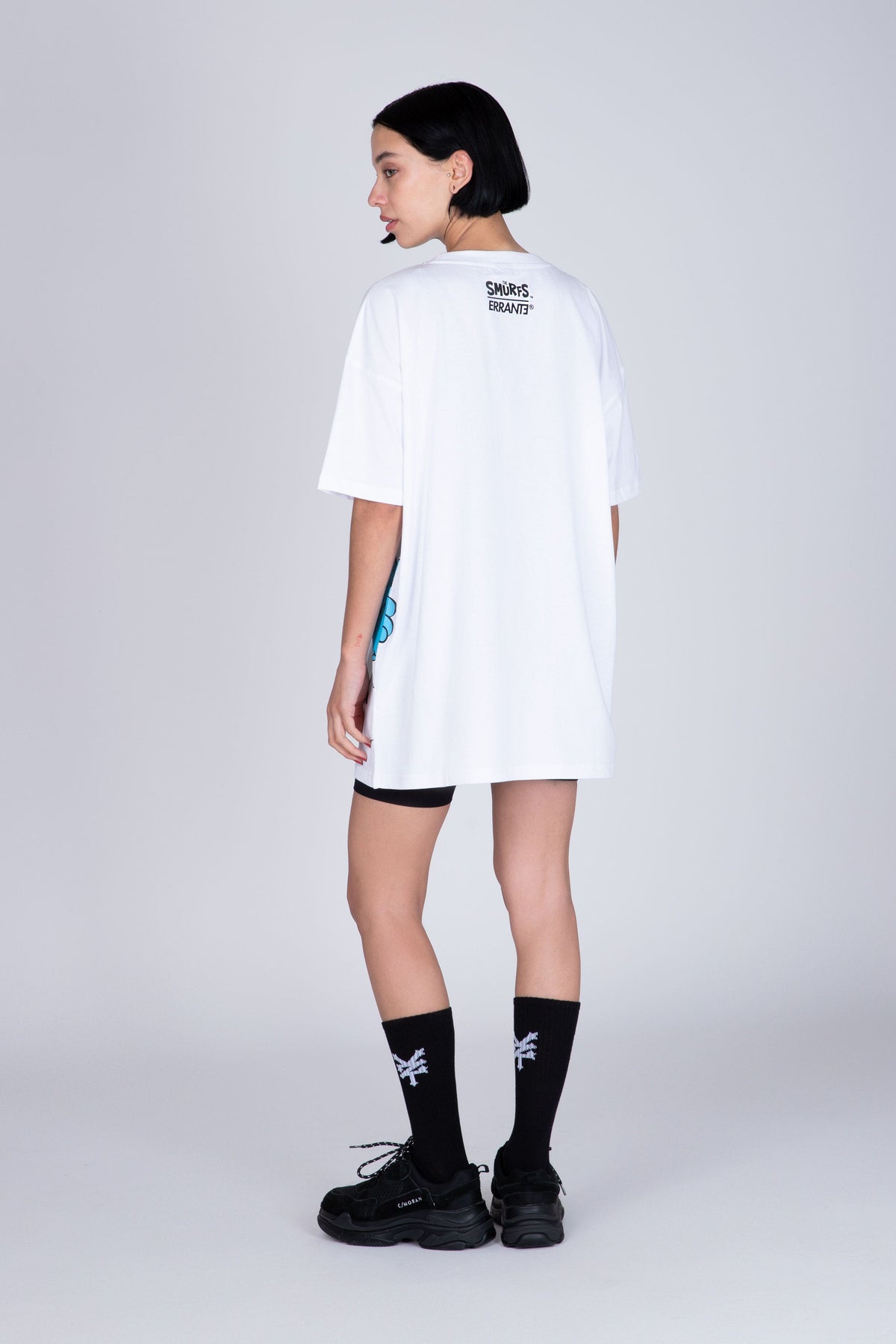 Polera Manga Corta Pitufos Peeking Blanco ERRANTE