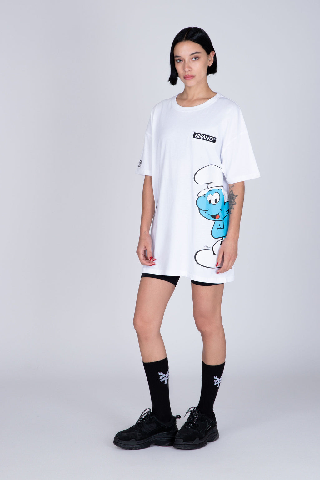 Polera Manga Corta Pitufos Peeking Blanco ERRANTE