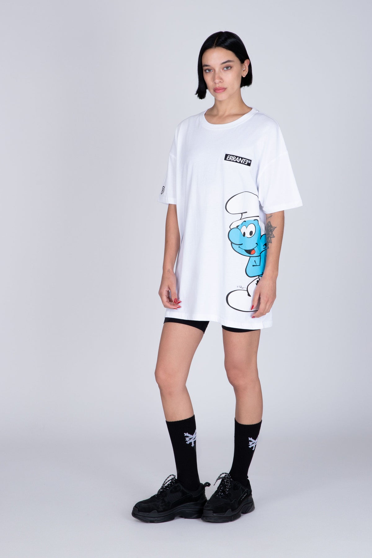 Polera Manga Corta Pitufos Peeking Blanco ERRANTE