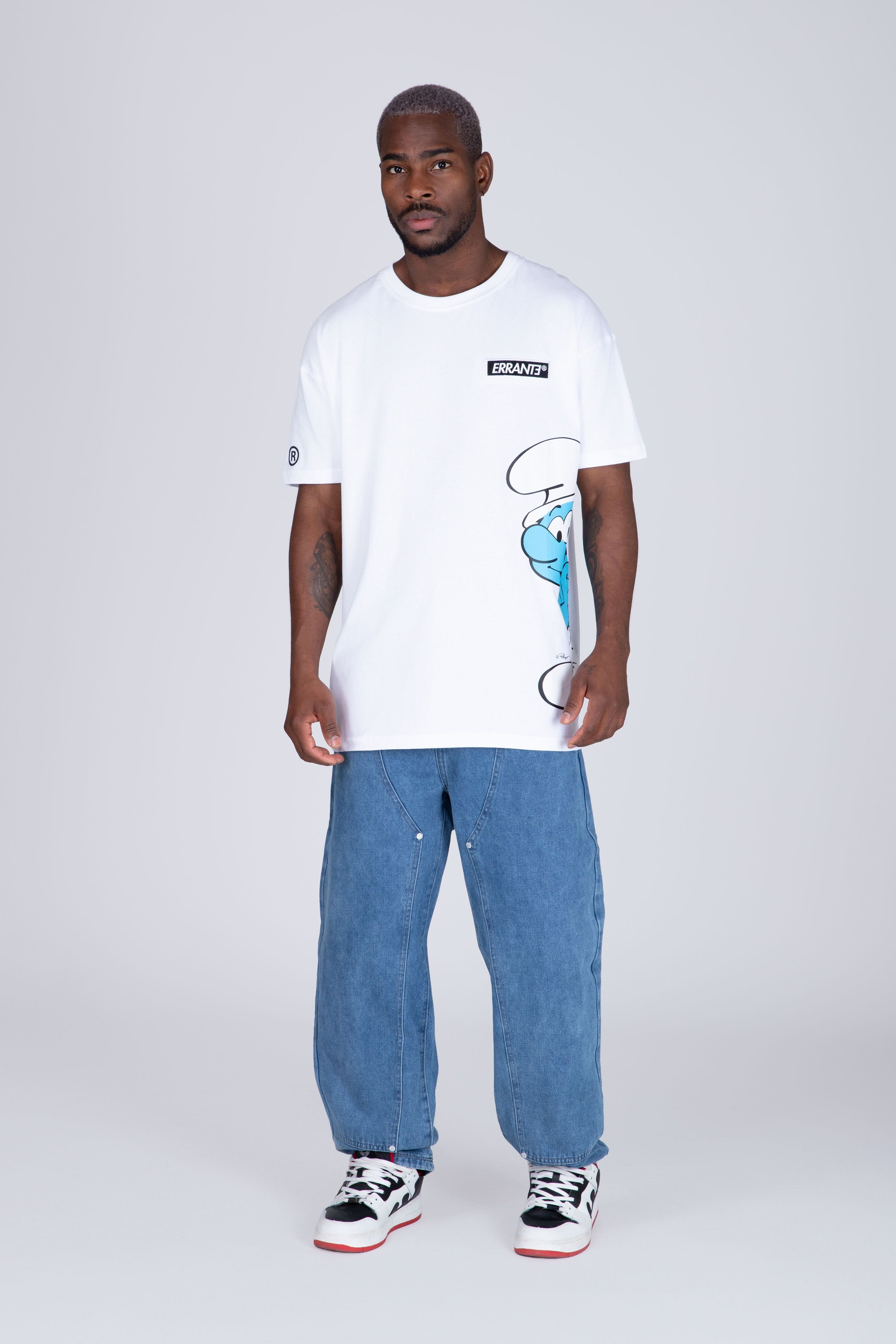 Polera Manga Corta Pitufos Peeking Blanco ERRANTE