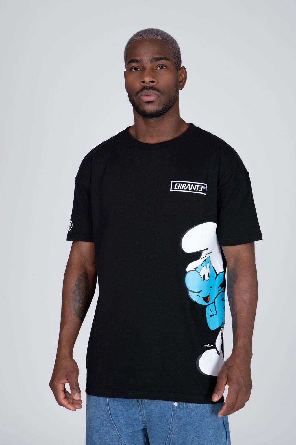 Polera Manga Corta Pitufos Peeking Negro ERRANTE
