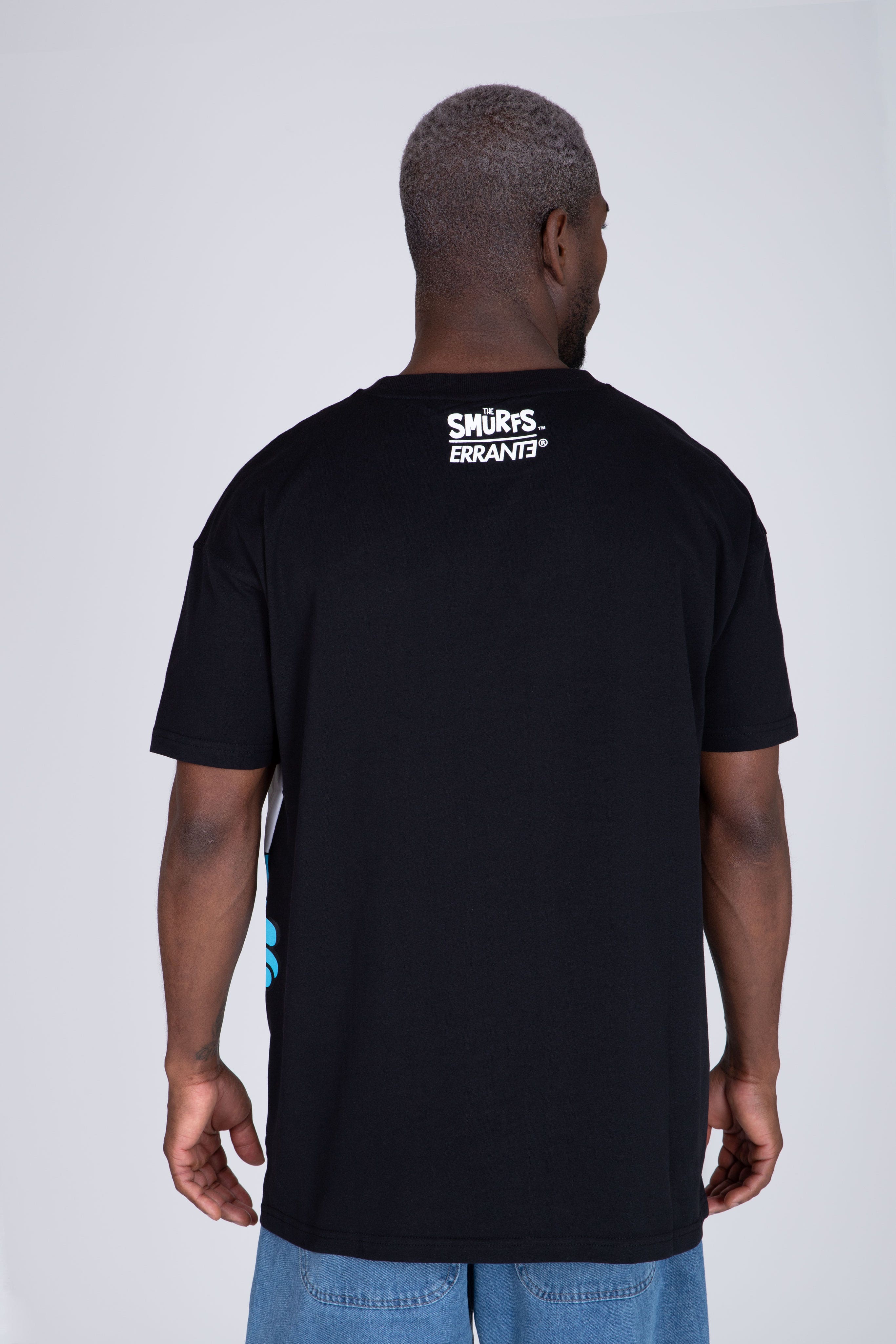 Polera Manga Corta Pitufos Peeking Negro ERRANTE