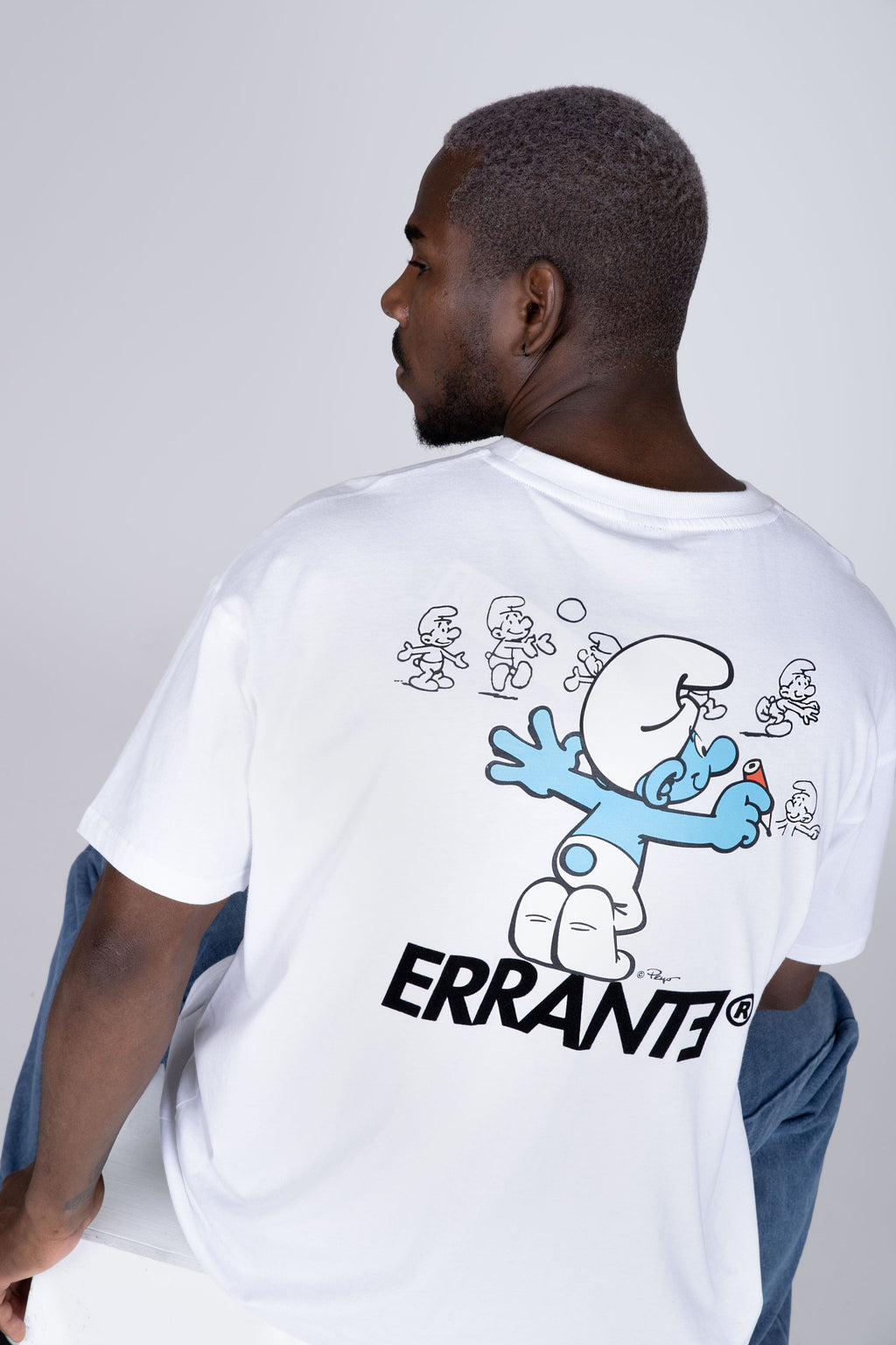 Polera Manga Corta Pitufos Sketch Blanco ERRANTE