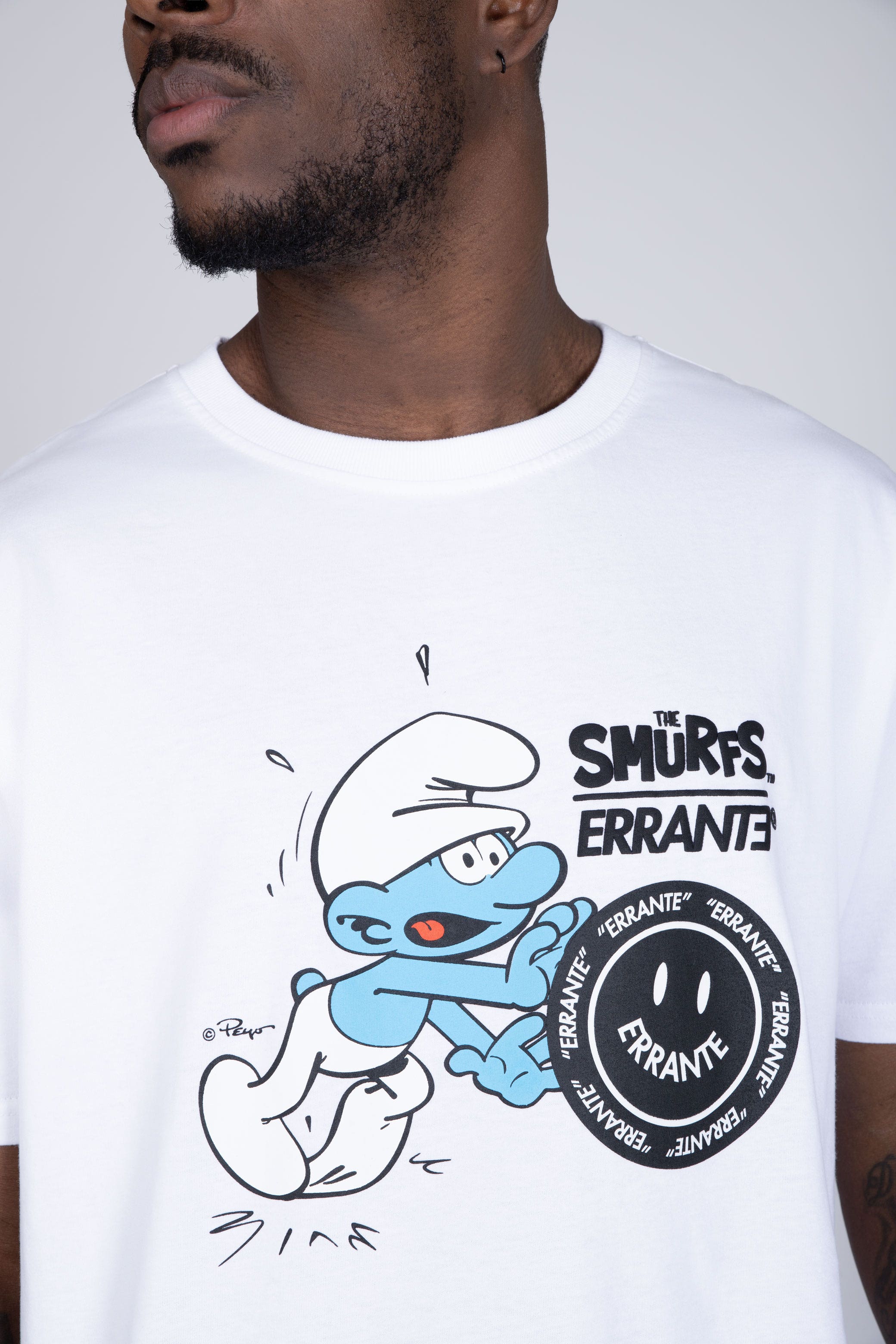 Polera Manga Corta Pitufos Smurfsrrante Blanco ERRANTE