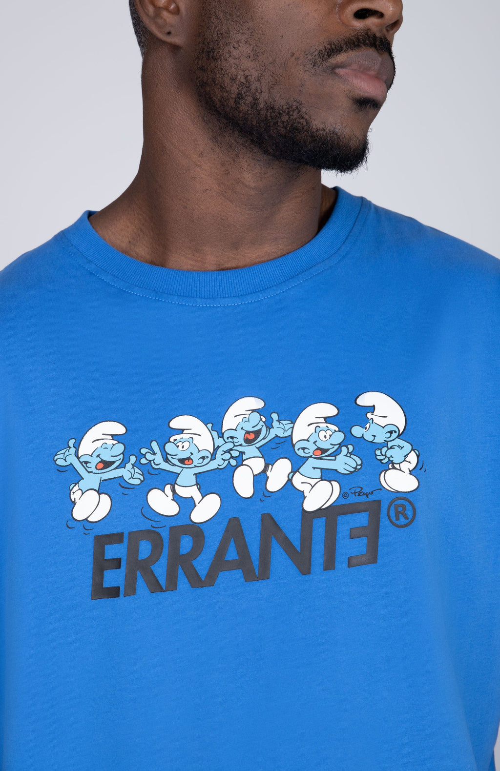 Polera Manga Corta Pitufos Village Azul ERRANTE