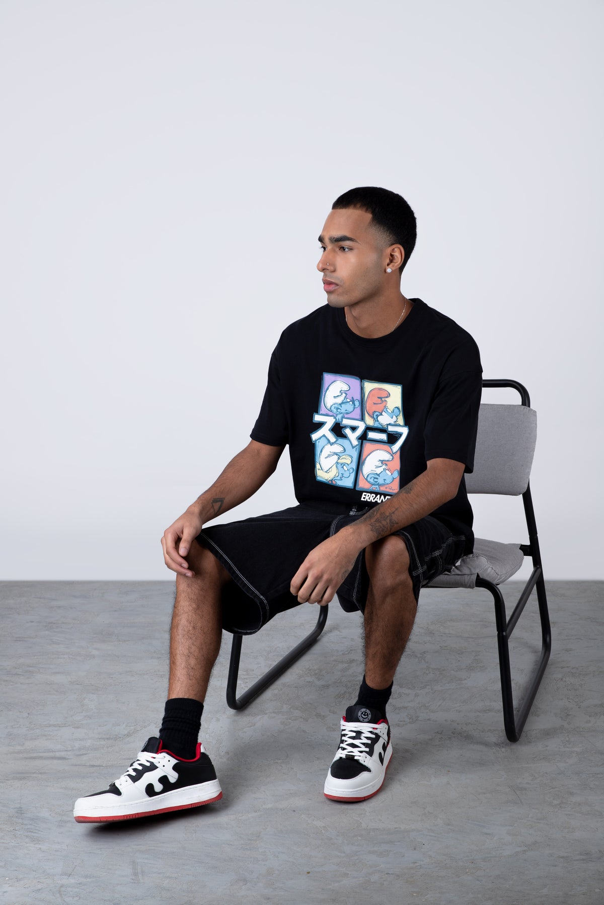 Polera Manga Corta Pitufos 4Smurfs Negro