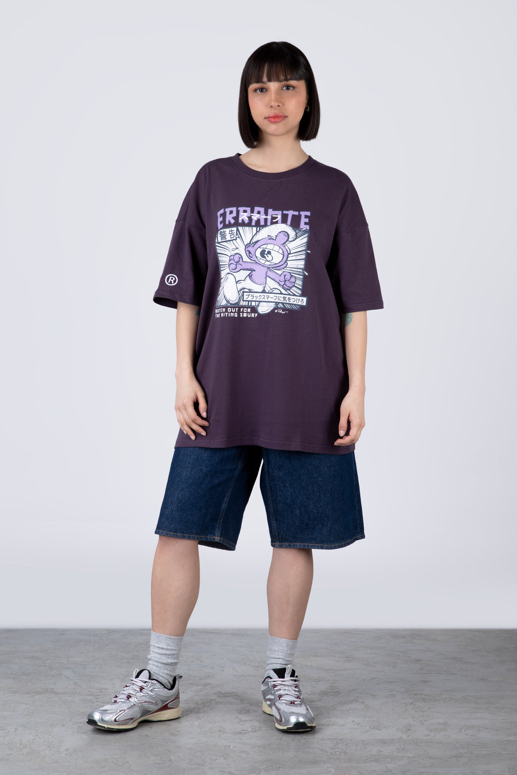Polera Manga Corta Pitufos Biting Morado