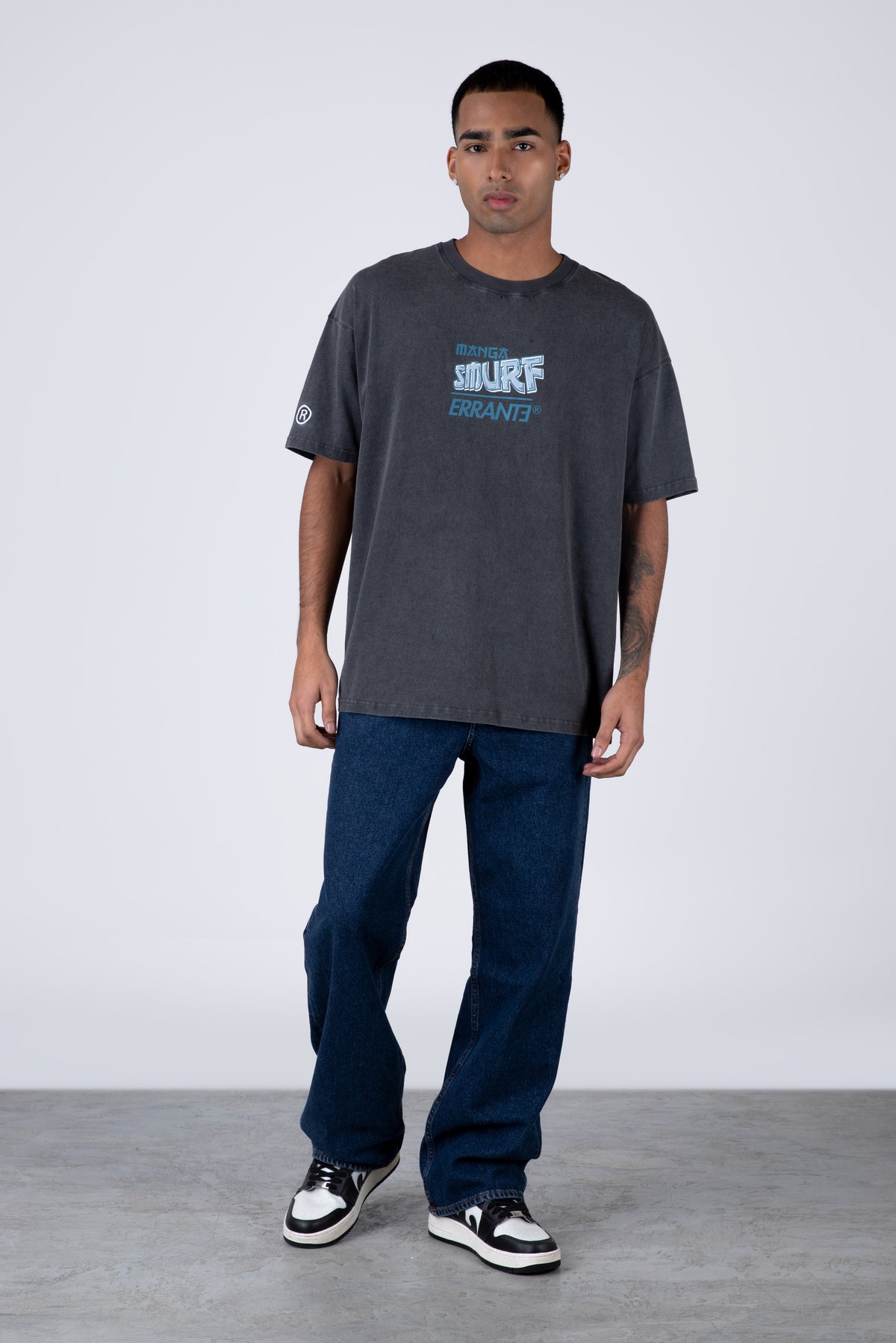 Polera Manga Corta Pitufos Scape Gris